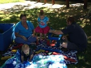 Kids Playing on a Blanket